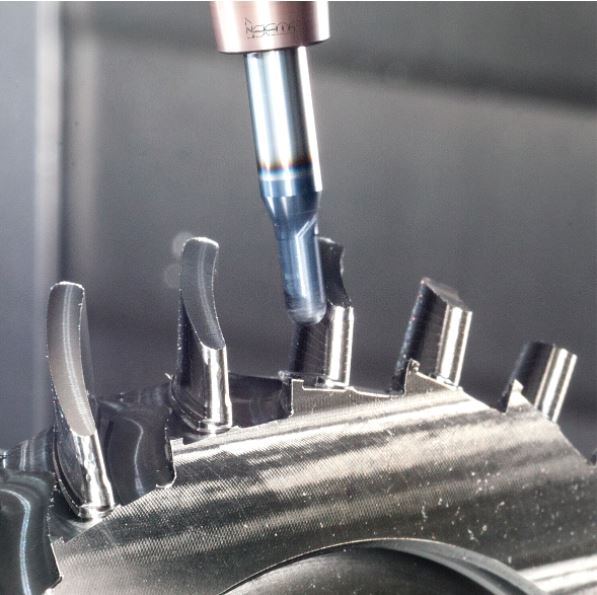 Fig. 4 – Trochoidal rough milling of a blisk airfoil by a multi-flute solid carbide endmill, which is mounted in a heat shrink chuck.